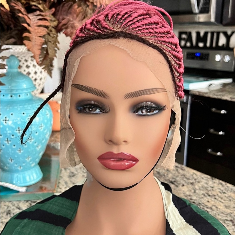 Beautiful braided corn row wig unit.